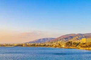 Beautiful Kavouri beach and bay Voula Vouliagmeni Greece. photo