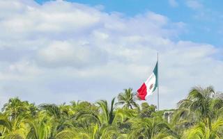 Mexican green white red flag in Zicatela Puerto Escondido Mexico. photo