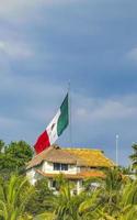 Mexican green white red flag in Zicatela Puerto Escondido Mexico. photo