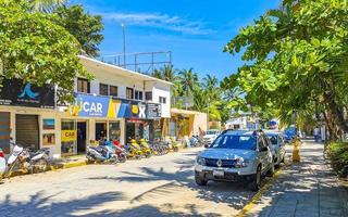 Puerto Escondido Oaxaca Mexico 2022 Scenic view tourist street palm city Zicatela Puerto Escondido Mexico. photo