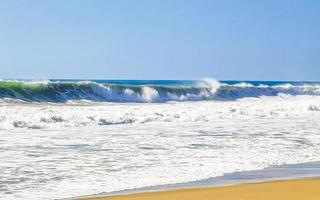 Extremely huge big surfer waves at beach Puerto Escondido Mexico. photo