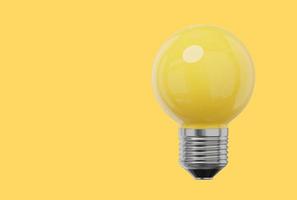Realistic yellow light bulb. 3D rendering. Icon on yellow background, text space. photo
