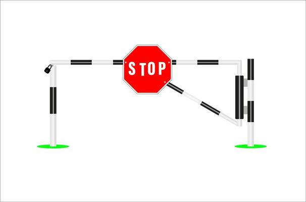 closed barrier with stop sign. Striped closed barrier gate