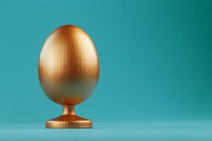 Golden egg on a blue background with a minimalistic concept. Space for text. Easter egg design templates. Stylish decor with minimal concept. photo