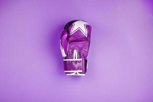 Pink Boxing gloves on a pink background, free space. photo