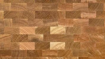 background and texture of cross section on oak wood furniture surface photo
