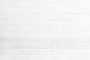 Light white color brick of wall background and pattern texture for background copy space in decoration of room in home photo