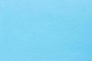 Light Blue Pastel color cement wall for taxture and background photo