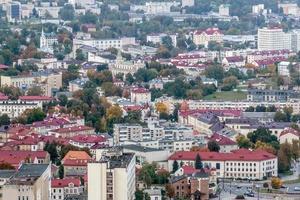 aerial panoramic view from height of a multi-storey residential complex and urban development in autumn day photo
