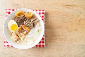 paste of rice flour or boiled Chinese pasta square in clear soup photo