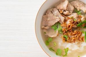 Pho Bo vietnamese soup with pork and rice noodles photo