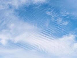 Empty blue sky with a cirrus clouds photo