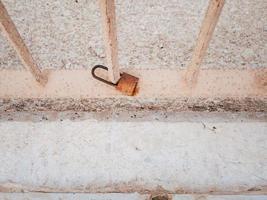 Photo of a padlock closed on the fence as a keepsake