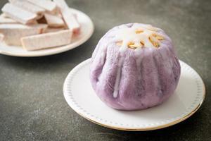 taro bun with white sugar cream and nut photo