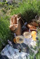 Summer picnic on a lavender field photo