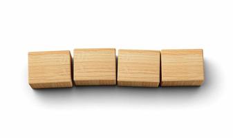 Four blank wooden block cubes on a white background for your text. free space for business concept 3d illustration photo