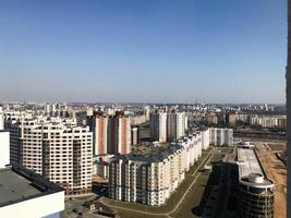 View of the beautiful panorama of the city with the roofs of large tall buildings of buildings of skyscrapers of new buildings photo