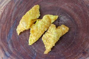 Fried dumplings,chinese food on wooden table. photo