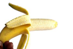 plátano pelado aislado sobre fondo blanco foto