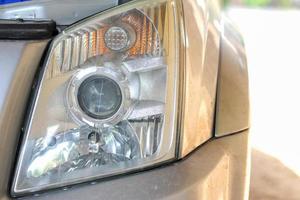 headlight of pickup car, image close-up part of automobile photo