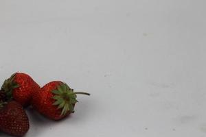 Strawberry jam with fresh strawberries photo