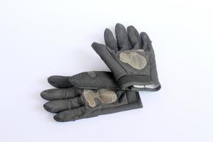 dirty old black gloves. photo