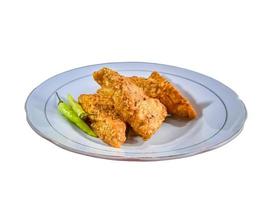 Tempe mendoan Triangular fried tempeh wrapped in wheat flour produces a savory taste photo