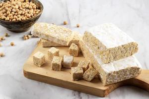 Raw Cubed Tempeh or Tempe, Fermented Soy Bean photo