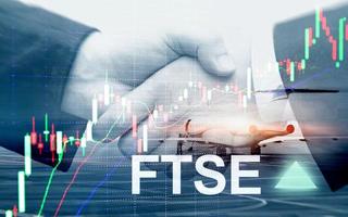 FTSE 100 Financial Times Stock Exchange Index United Kingdom UK England Investment Trading concept with chart and graphs. photo