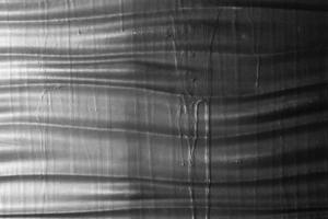 Abstract background Graphite gray wavy texture. Decorative wall decoration photo