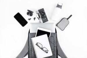 Modern backpack with laptop and tablet inside photo