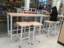 Probolinggo,Indonesia. Oct. 30,2022 - chairs and tables with a modern minimalist concept in a cafe photo