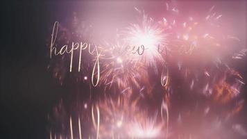 bucle feliz año nuevo 2023 texto dorado con fuegos artificiales. video
