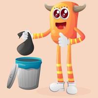 Cute orange monster placing reusable waste into garbage can vector