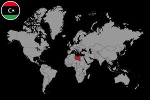 pin mapa con la bandera de libia en el mapa mundial. ilustración vectorial vector