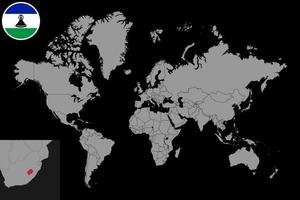 Pin map with Lesotho flag on world map. Vector illustration.