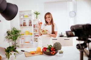 Attractive Blogger Girl Making Video For You photo