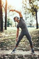 Starting His Workout With A Stretch photo