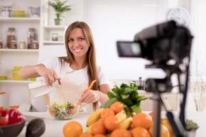 Attractive Blogger Girl Making Video For You photo