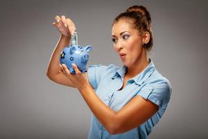 Businesswoman With Piggy Bank photo