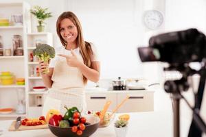 Attractive Blogger Girl Making Video For You photo