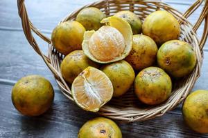 Fresh oranges in a basket photo