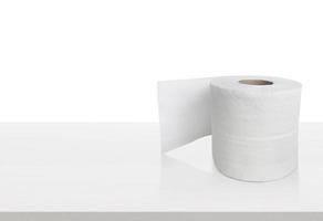 Toilet paper isolated on white table. Cleaning concept product photograph for advertising photo