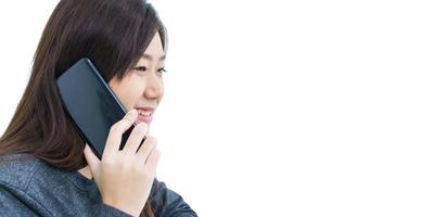 Young woman long hair talking by mobile phone photo