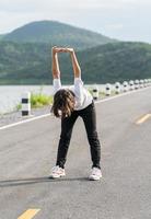 Woman short hair doing exercising outdoor photo