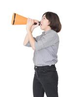 Young woman shouting for announce through a megaphone photo