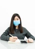 Teenage female student preparing for learnning at home photo