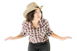 Young woman in a plaid shirt posing in studio on white background photo