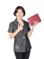 Young female short hair holding up red book photo