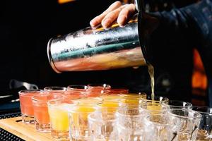 beautifully decorated cocktail in a nightclub, people drink a drink photo